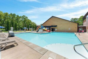 Community pool with tube slide