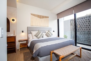 The master bedroom features a comfortable king size bed