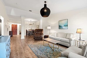 Plush seating that faces a flat-screen Smart TV