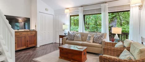 Living area with seating, smart tv and amazing views