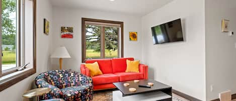 Welcome to 57 Gateway Getaway! Living space includes comfortable seating and Smart TV
