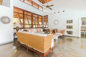 Living room with a lot of natural sun light.