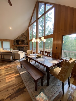 Open living area with hardwood floors and beautiful sunsets