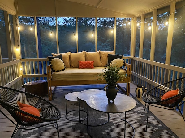 Screened in porch for enjoying summer nights.