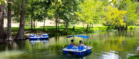 Paddleboats and waterside docks at both houses