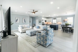 Spacious living room, dining room and kitchen create a free flowing living area