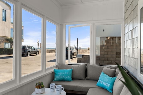 Our enclosed patio. Sit, relax, and enjoy a nice cup of coffee!
