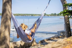 Picture yourself relaxing in this hammock watching the sunset over the bay.