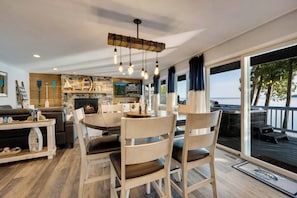 Enjoy amazing lake views while eating dinner or relaxing in the living room.