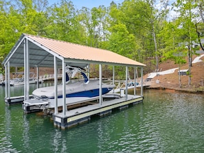 Uncovered Boat parking on the right hand side of the dock.