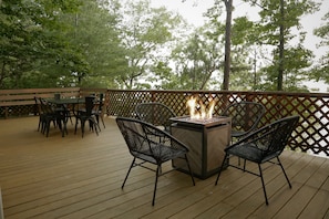 Large Deck With Stunning Lake Views | Dining Table | Cozy Fire Table | Additional Seating in Covered Sun Porch