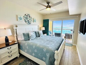 Our primary bedroom has a king bed and its own private balcony.