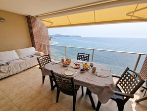 Terrace with furniture and sea views.