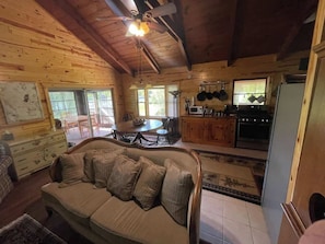 Living room, dining, and kitchen area