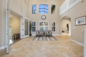 This grand entryway warmly welcomes you into this gorgeous home