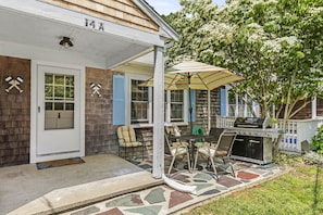 This cottage features three separate outdoor patios. Patio Table and a propane grill