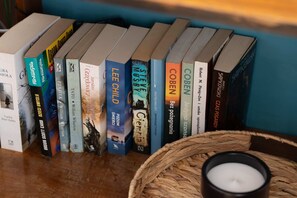 A charming corner with a collection of books, adding a personal and cozy touch to the interior.