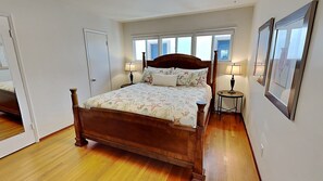 Master Bedroom with King Bed, TV, and walk in closet