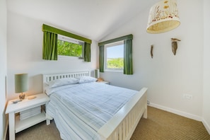 The Billy Shed, Eype: Bedroom One, with a 4'6 double bed, and views of the Dorset countryside