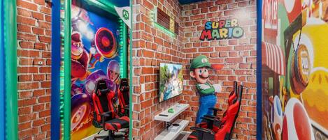 Game room with arcade games and games consoles