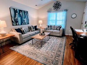 Spacious living area with queen sleeper sofa