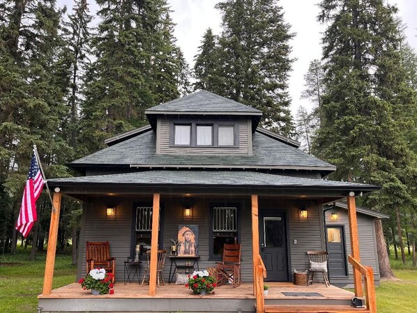 Front of house with front porch. Plenty of parking! 