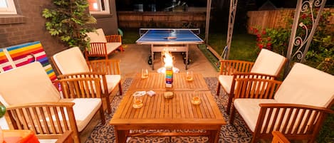 6-seater patio with jengga + additional lounge area for the ping pong area