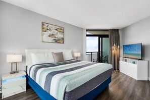 Indulge in luxury and comfort in the spacious master bedroom, featuring a king-sized bed and elegant furnishings.