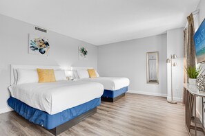 Sink into plush bedding and premium linens, guaranteeing a restful night's sleep after a day of beachside adventures.