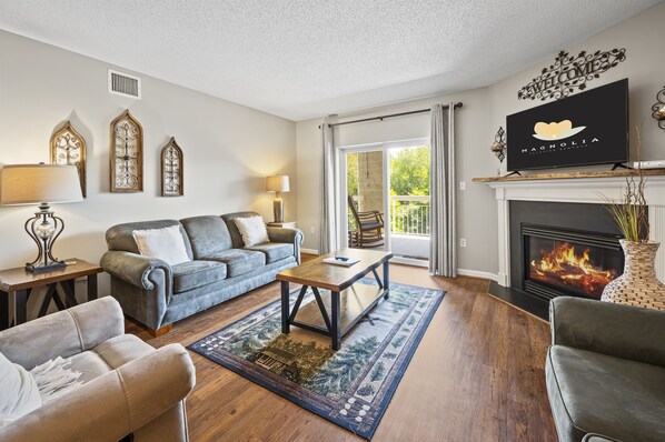 Stylish and comfortable living room with a seasonal gas fireplace.