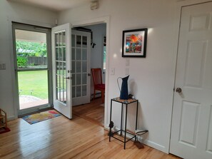 entry with sofa bedroom off to right