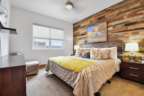 Master bedroom with king size bed, elevate your feet or your head, or both!