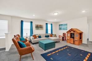 Head up to the spacious second-floor TV loft.