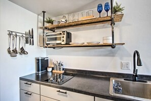 Full kitchen with toaster oven, microwave, Keurig coffee make, electric stovetop
