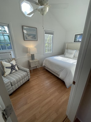 Primary Bedroom with Queen Bed, Soft plush linens, and plenty of storage space.
