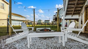 You can enjoy making new memories around the firepit w/string lights.