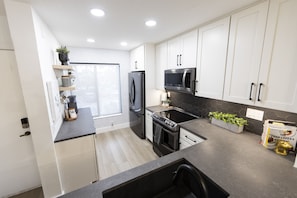 The kitchen was recently renovated and includes top-of-the-line LG appliances.