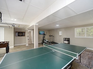 Play, exercise, or do laundry downstairs in the converted garage.