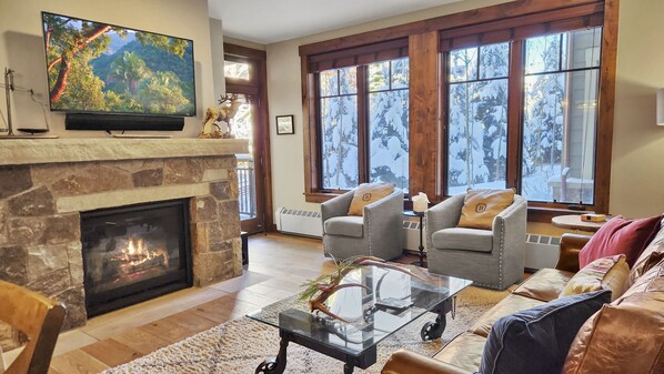 Living room: Smart TV with cable, gas fireplace, central heat, no A/C