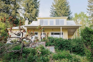 View of the front of the hillside home