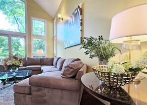 Living room with plenty of seating to cozy up and visit with loved ones