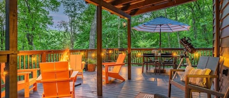 Take in the views and sounds of the rustling trees  while enjoying our luxurious outdoor living space. 