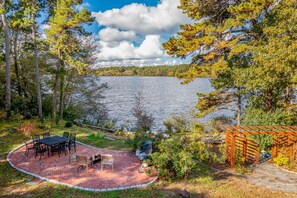 Relax on the patio overlooking the pond