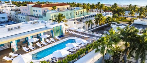 SoBeSuites by AmericanVacationLiving (top of photo), next door Tiffany Rooftop Bar with heated pool access from $25/pp with DayPass featuring Poolside Bar/Food/Beverage, Towel service, Wifi (subject to availability & price fluctuation), next to News Cafe.