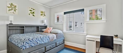 Cozy bedroom to recharge with workstation for productivity