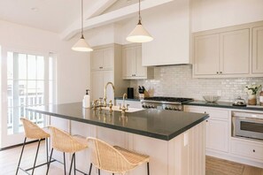 Well equipped kitchen has high end appliances, and everything you could need to cook a gourmet meal