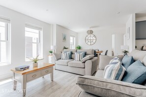 The apartment benefits from an open planned living space