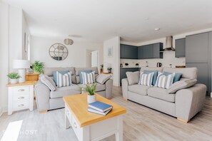 Chic furnishings and inviting textures make this living room a true sanctuary.