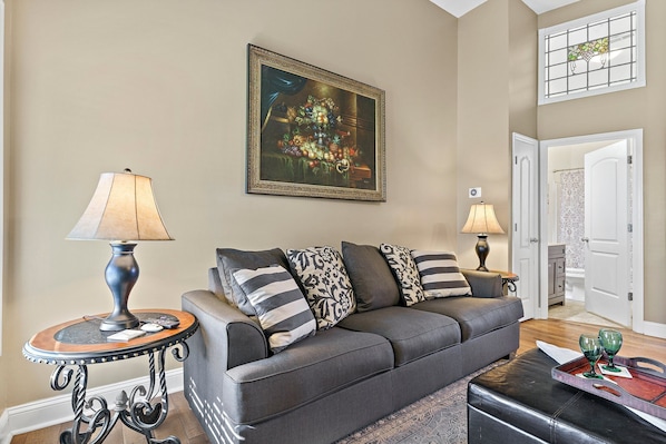 Sugar Berry Suite's living space with high ceilings.