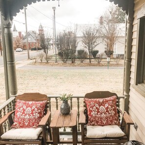 Enjoy coffee on the front porch before strolling downtown around Big Spring Park
